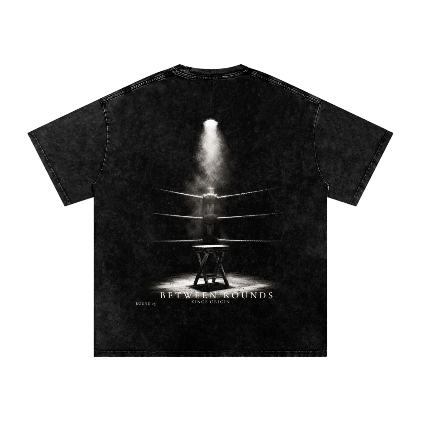 Front mockup: Kings Origin Between Rounds snow washed heavyweight tee, KO center chest print, black, front view
Back mockup: Kings Origin Between Rounds tee, cinematic boxing corner graphic, empty stool under single light, between rounds text, back view
Lifestyle shot (when you have it): Kings Origin Between Rounds heavyweight tee worn in training environment